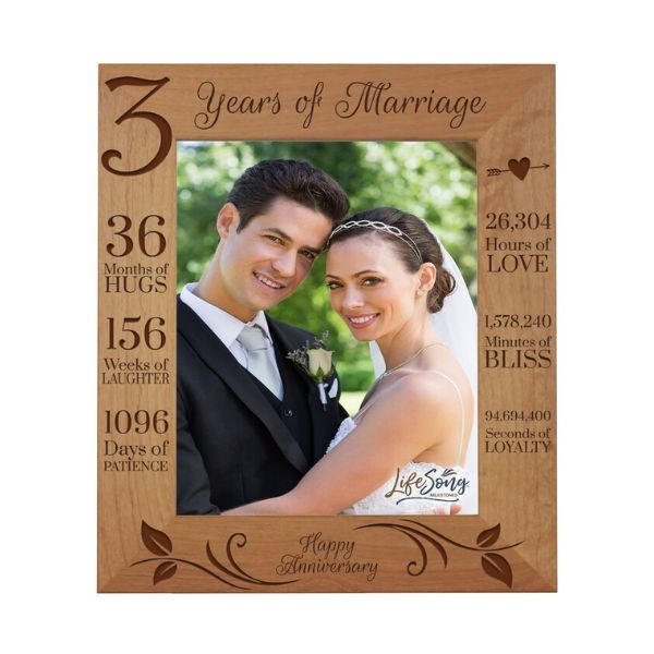 Loving couple framed in a 3rd Anniversary Wood Picture Frame, embodying a timeless three year anniversary gift.