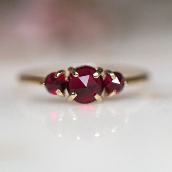 4K Gold Triple Ruby Ring, a luxurious choice for a 40th wedding anniversary gift.
