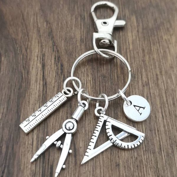 Architect Keychain featuring iconic drafting tools, a daily reminder of the architectural profession's essence.