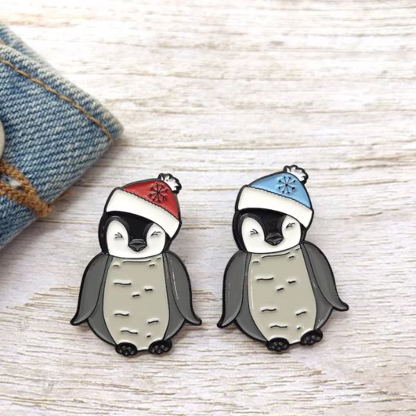 Baby Penguin Enamel Pin adds a touch of cuteness to any outfit.