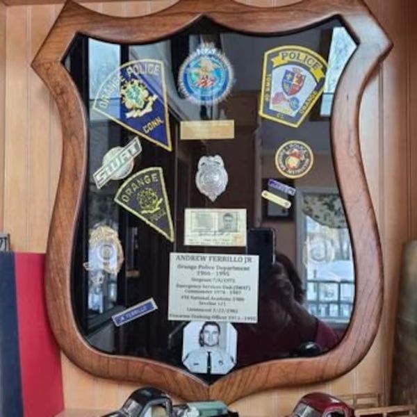 Badge Display Shadow Box for showcasing police service, a perfect police retirement gift.