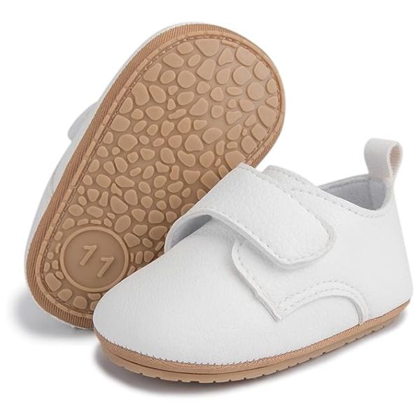 Personalized Keepsakes: Soft and pristine baptism shoes for little feet.