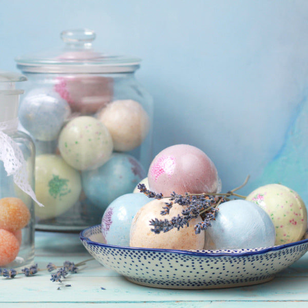 Colorful assortment of scented bath bombs, a relaxing and fun choice in gifts for single moms.
