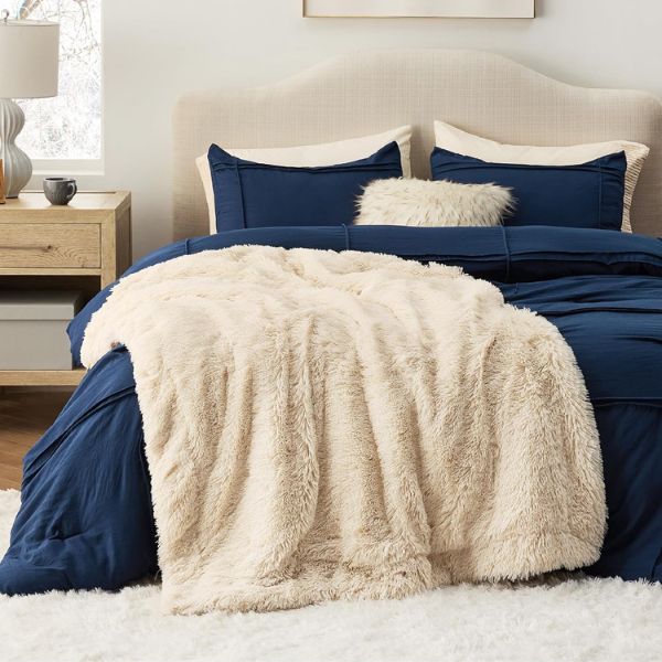 Bedsure Soft Fuzzy Faux Fur Throw Blanket Light Khaki, a cozy and stylish blanket to add warmth and comfort to a doctor's relaxation time.