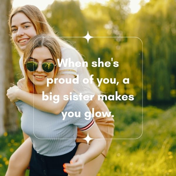 Two happy sisters enjoying a piggyback ride in a sunlit park, with a quote about the pride and glow a big sister brings.