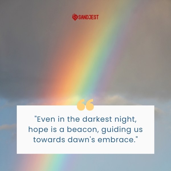 A rainbow arching through a cloudy sky symbolizes a hope quote about optimism in the face of darkness.