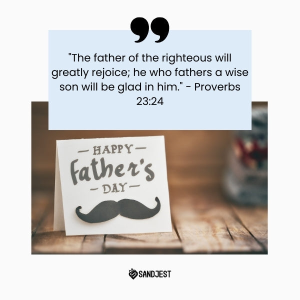 A rustic Father's Day card with a mustache motif resting on a wooden surface, accompanying a Bible verse from Proverbs celebrating a father's joy.