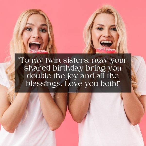 Twin sisters biting donuts with a joyful birthday greeting on pink background.