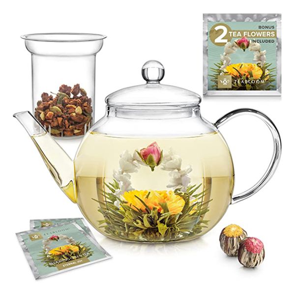 The Blooming Glass Teapot Set is a graceful and functional gift for your girlfriend's mom