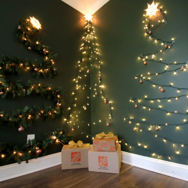 Festive wall-mounted string light Christmas tree, a modern twist on traditional christmas light decorations.