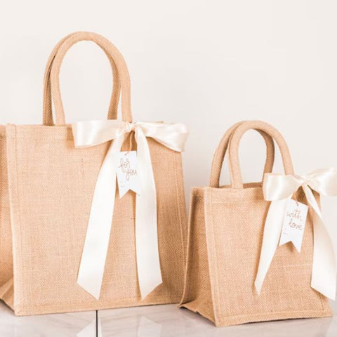 Eco-friendly burlap tote bags, a practical wedding favor.