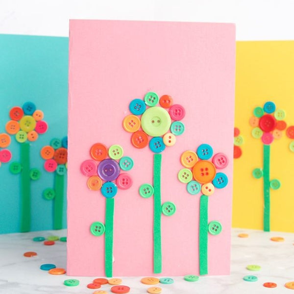 A mother's day card adorned with colorful button flowers.