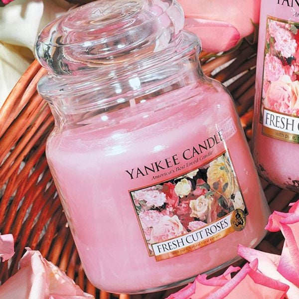Candle Fresh Cut Roses Jar Candle - A fresh-cut roses jar candle to create a cozy atmosphere during your get-togethers.