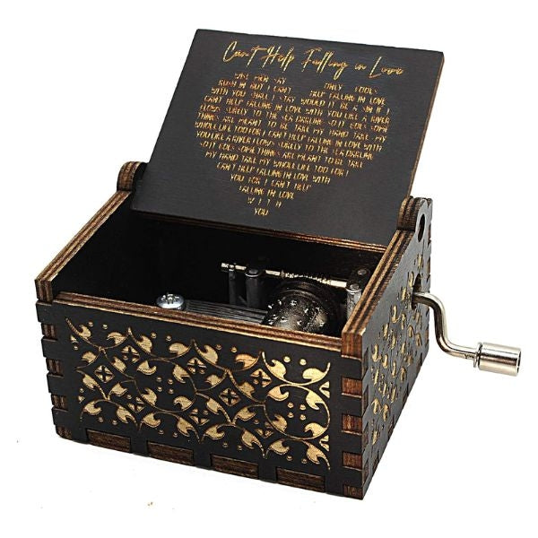 'Can't Help Falling in Love' Wood Music Box, a classic Valentine's Day gift for him, playing a timeless melody.