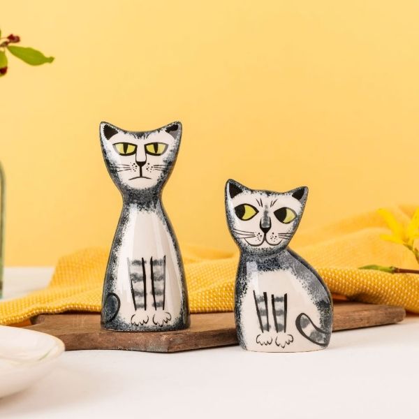 Enhance the dining table's charm this Christmas with cat-designed salt and pepper shakers.