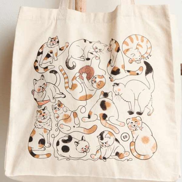 Carry your essentials with style using the Cats Tote Bag, a practical and charming gift for cat moms.