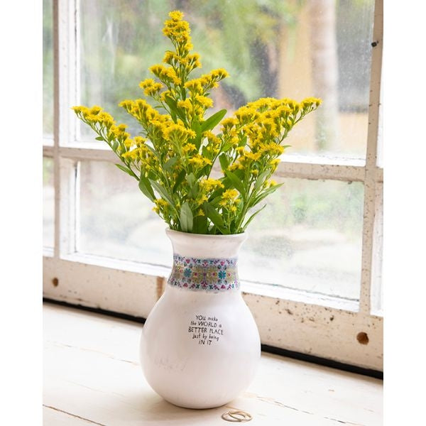 Brighten her day with a Ceramic Bud Vase, a charming Mother's Day gift for your girlfriend.