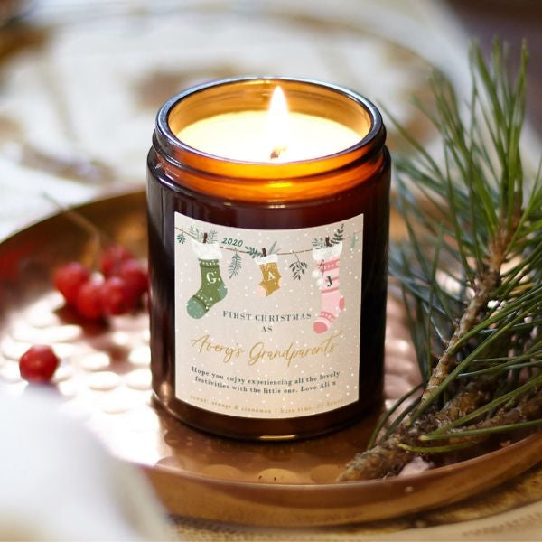 A festive Christmas candle, a heartwarming selection from the Christmas gifts for grandparents, radiating the warmth of the season.
