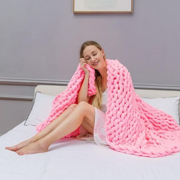 Wrap her in warmth with a Chunky Knit Blanket Throw, a cozy Valentine's gift for daughters.