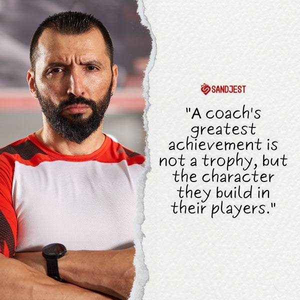 A serious male coach on the track field, reflecting coaching sport quotes on player development.