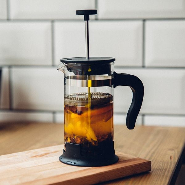 A stainless steel coffee press, the perfect addition to your outdoor gear collection for a delightful brew while camping, an ideal choice for outdoor gifts for dads