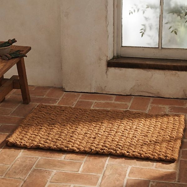 The festive Coir Doormat, a warm welcome and a charming addition to Christmas gifts for grandparents