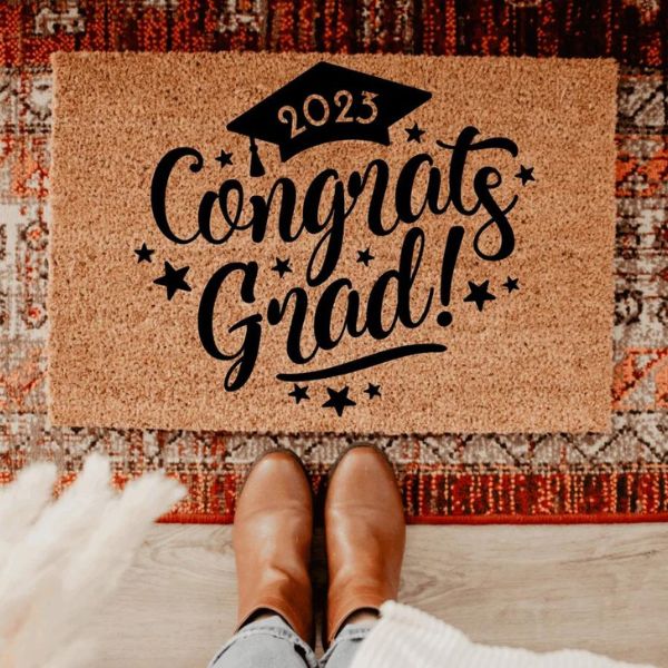 Welcome them to the next chapter with the Congrats Grad Door Mat - a cheerful graduation gift.