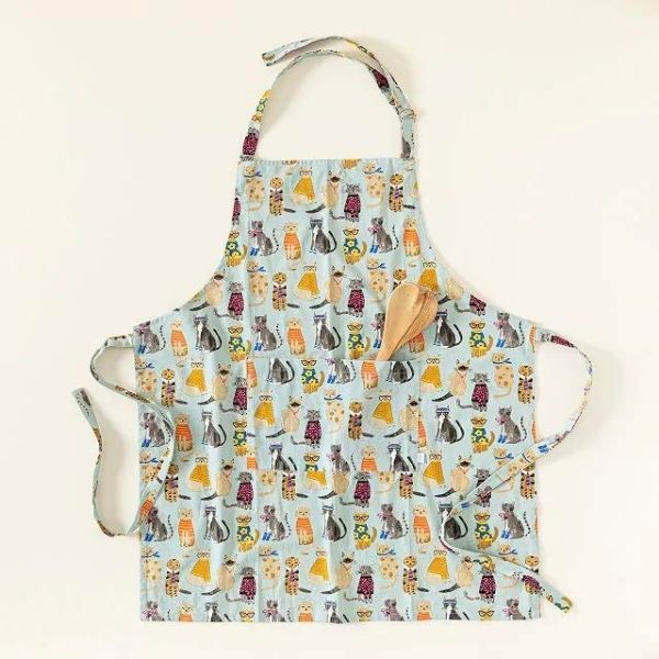 Cool Cat apron, a quirky and functional gift under $50 for her cooking adventures.