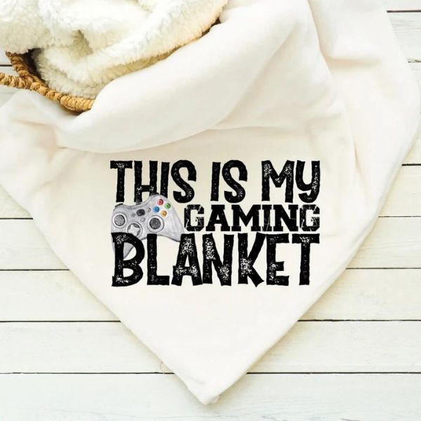 Cozy Sherpa Blanket - Stay warm and comfortable during marathon gaming sessions.