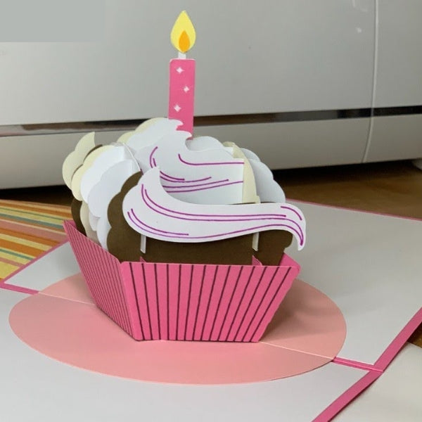 A creative pop-up cupcake mothers day card idea with a single candle.