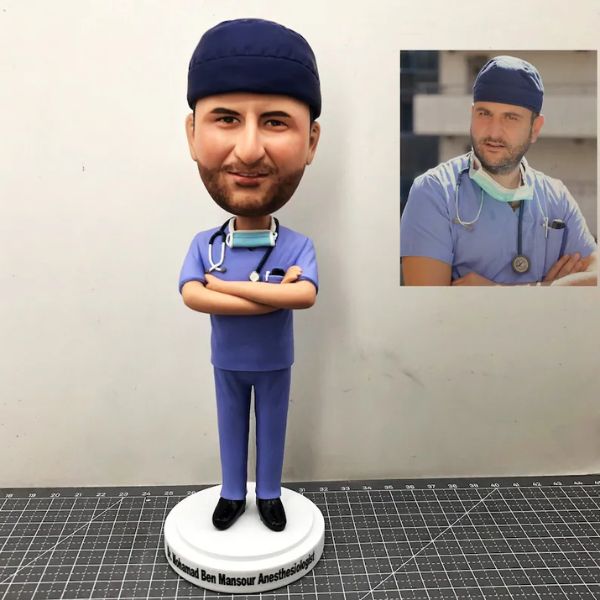 Custom Bobblehead in Scrubs, a whimsical and personalized gift for male nurses to cherish their healthcare journey.
