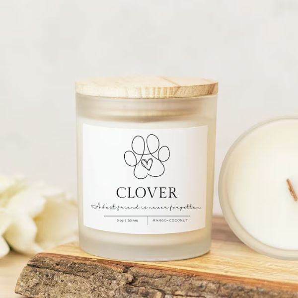 Custom candle dedicated to a pet named Clover, a warm remembrance for a furry friend.
