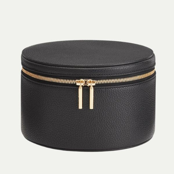 Keep her essentials organized in style with the Cuyana Personalized Leather Wellness Case, a sophisticated anniversary gift for your wife.