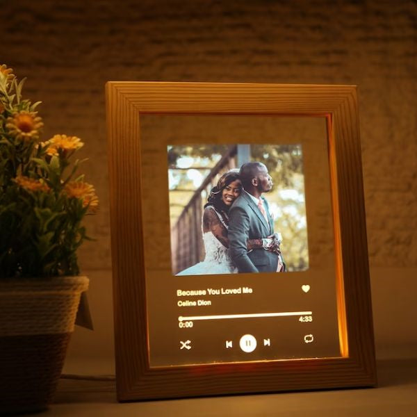 Digital Photo Frame for Shared Memories, a modern and personalized engagement gift to display their love story.