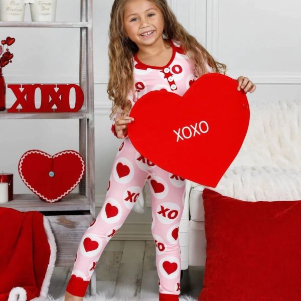 Cozy Disney-themed cotton pajamas for kids, a snug and delightful bedtime choice among Valentine's Gifts for Kids.