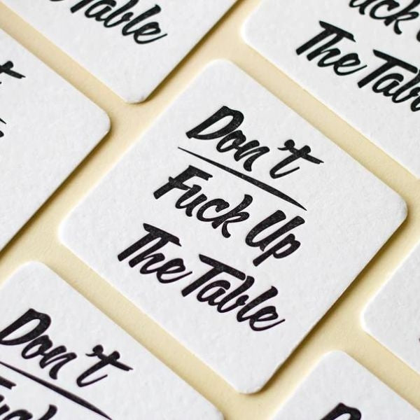 Cheeky 'Don't F*ck Up The Table' letterpress coasters for Mother's Day.