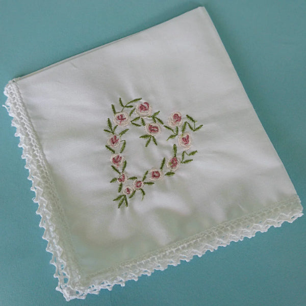 An Embroidered Handkerchief, a symbol of love and appreciation, a heartfelt wedding gift for mom to hold close on her special day.