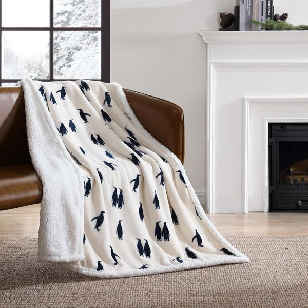 Emperor Penguin Fleece Throw adds a touch of Antarctic charm to any room.