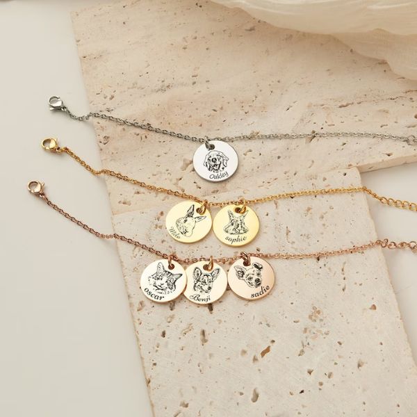 Personalized engraved charms bracelet, a collection of pet memories to adorn the wrist.