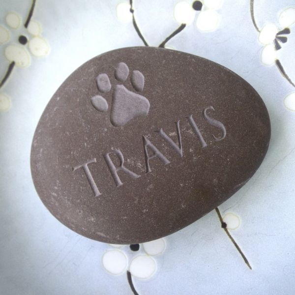 Engraved memory stone for a pet named Travis, a solid token of everlasting love