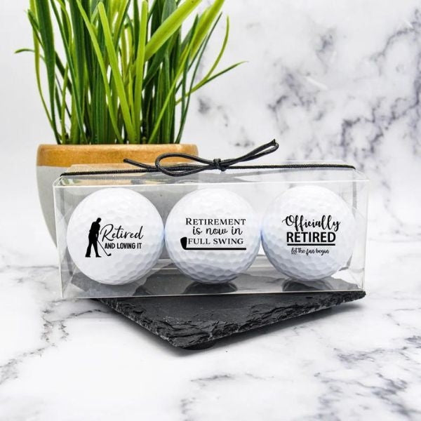 Engraved Golf Ball Set, a thoughtful retirement gift for dad's favorite pastime