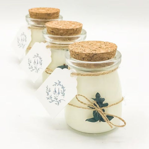Soothing eucalyptus candles, an aromatic wedding favor.