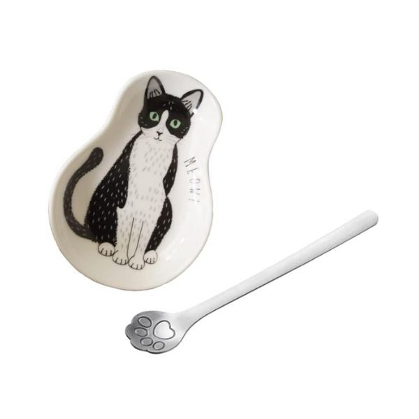 'Everything Tastes Better With Cat Hair In It' Ceramic Spoon Holder is a fun addition to your kitchen.