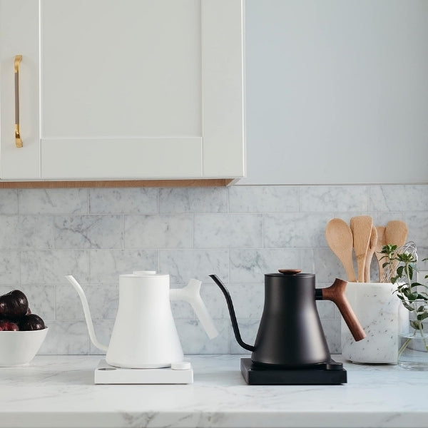 Fellow Stagg EKG Kettle, a sleek electric pour-over gift for tea lovers.