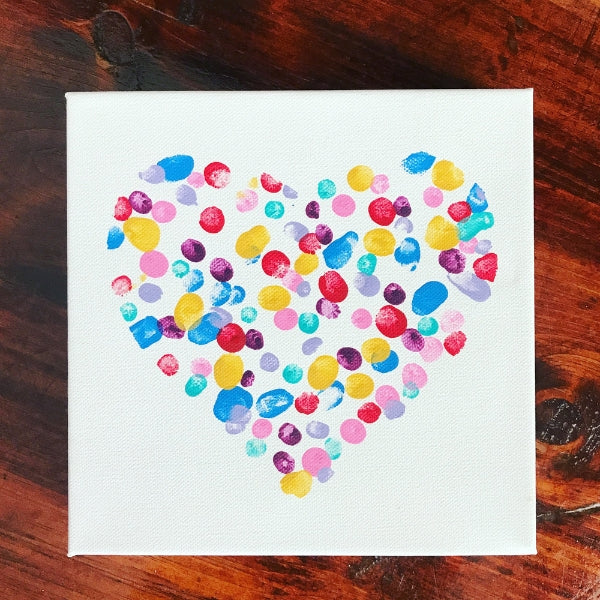 A card featuring a heart made from fingerprints for a personal touch