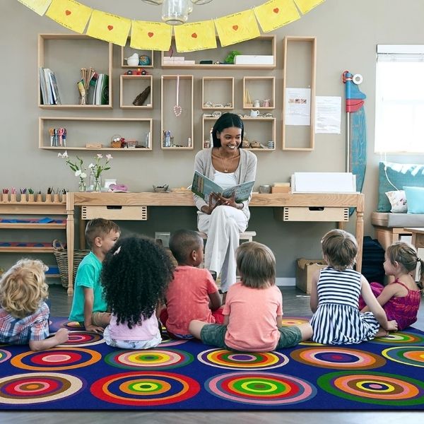 Add vibrancy with Flagship Carpets Color Rings Colorful Children's Area Rug, a cheerful gift for teacher valentine gifts.