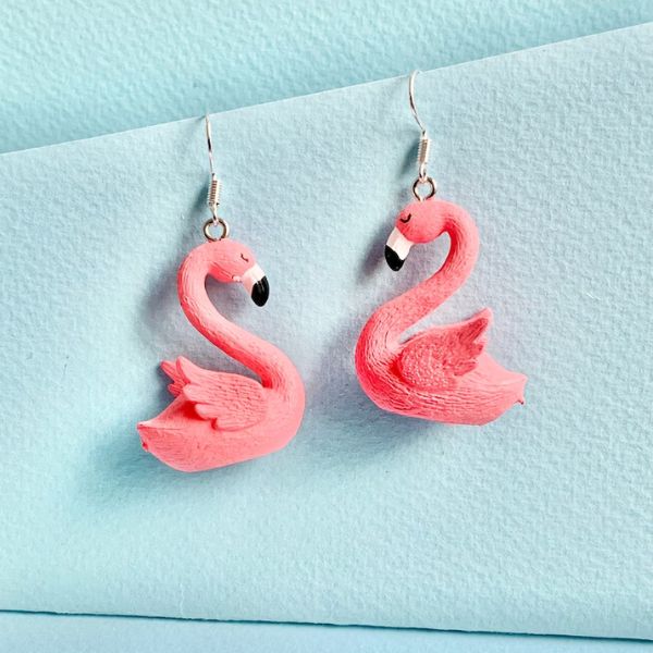 Flamingo Pink Dangle Earrings add a pop of color to your jewelry collection.
