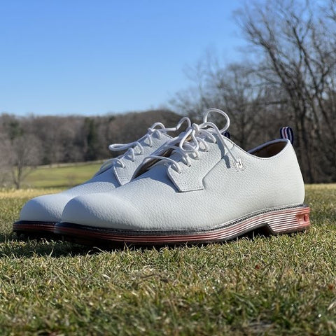 The FootJoy Men's Premiere Series, a premium choice among Unwrapping 40 Father's Day Golf Gifts, providing unmatched comfort and performance on the golf course