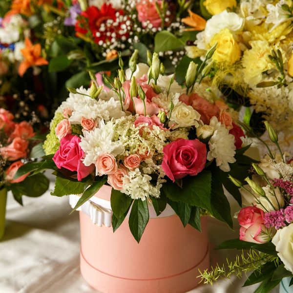 A vibrant Fresh Flower Bouquet is a classic and heartfelt gift to brighten your girlfriend's mom's