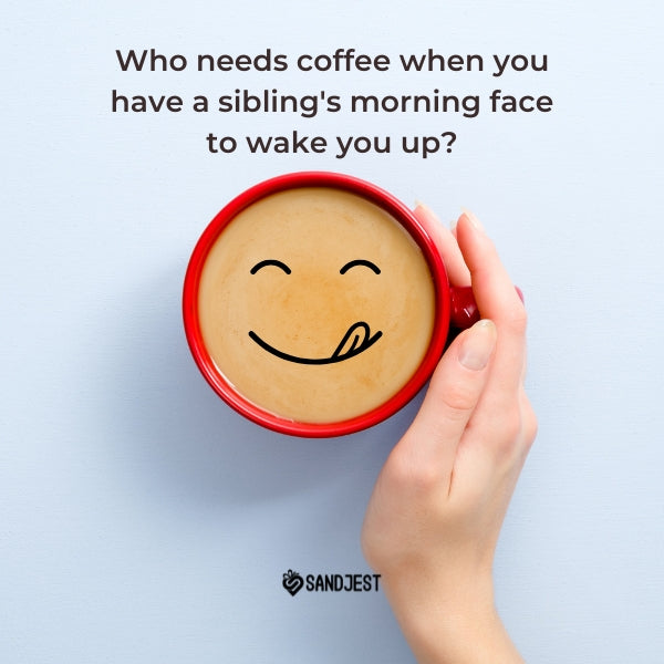Hand holding a red mug with a smiling coffee, funny good morning quote from Sandjest.